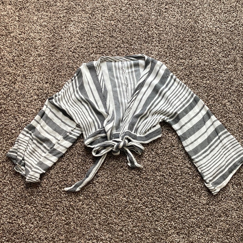 Dark grey and white striped bathing suit top coverup.